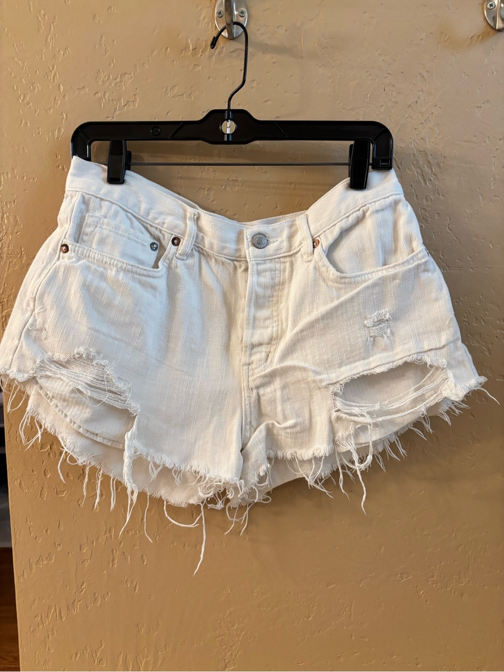 We The Free White Distressed Denim Cutoff Shorts